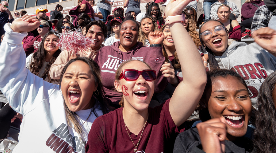 Auggies cheer at the homecoming football game, October 2022